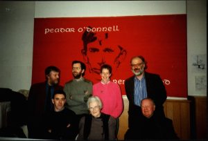 Reference Code: MSS.33.2.3 (4)
Title: Photograph of Derry Trade Union Council members with a banner of Peadar O?Donnell in the background  
Creation Date: February 1993
Level of Description: File
Extent and Medium: 1pp
Creator (s): Unknown 
Scope and Content: MSS.33.2.3 (4) Photograph of Derry Trade Union Council members with a banner of Peadar O?Donnell in the background dated February 1993
